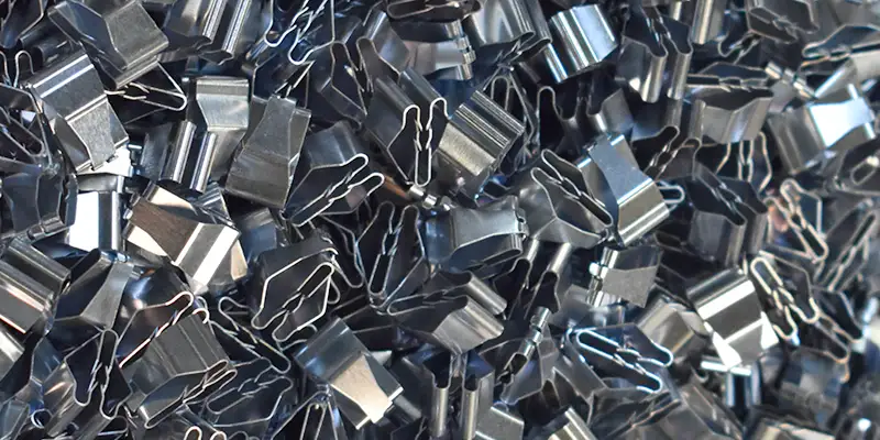 Supplier of custom metal parts for automotive OEMs Supplier of custom metal clips, contacts and parts for automotive OEMs