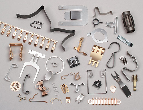 Fourslide flat springs, spring clips, contacts and wire wire forms